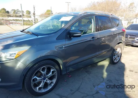 2014 Ford Escape Titanium z USA, uszkodzony, nr VIN 1FMCU0JX6EUC27993